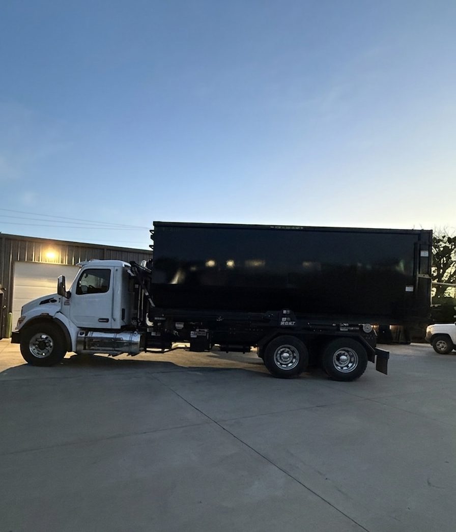 Roll-off dumpster delivery truck serving the Lawton area
